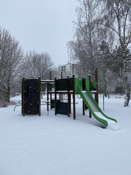 Climbing wall and slide in winter